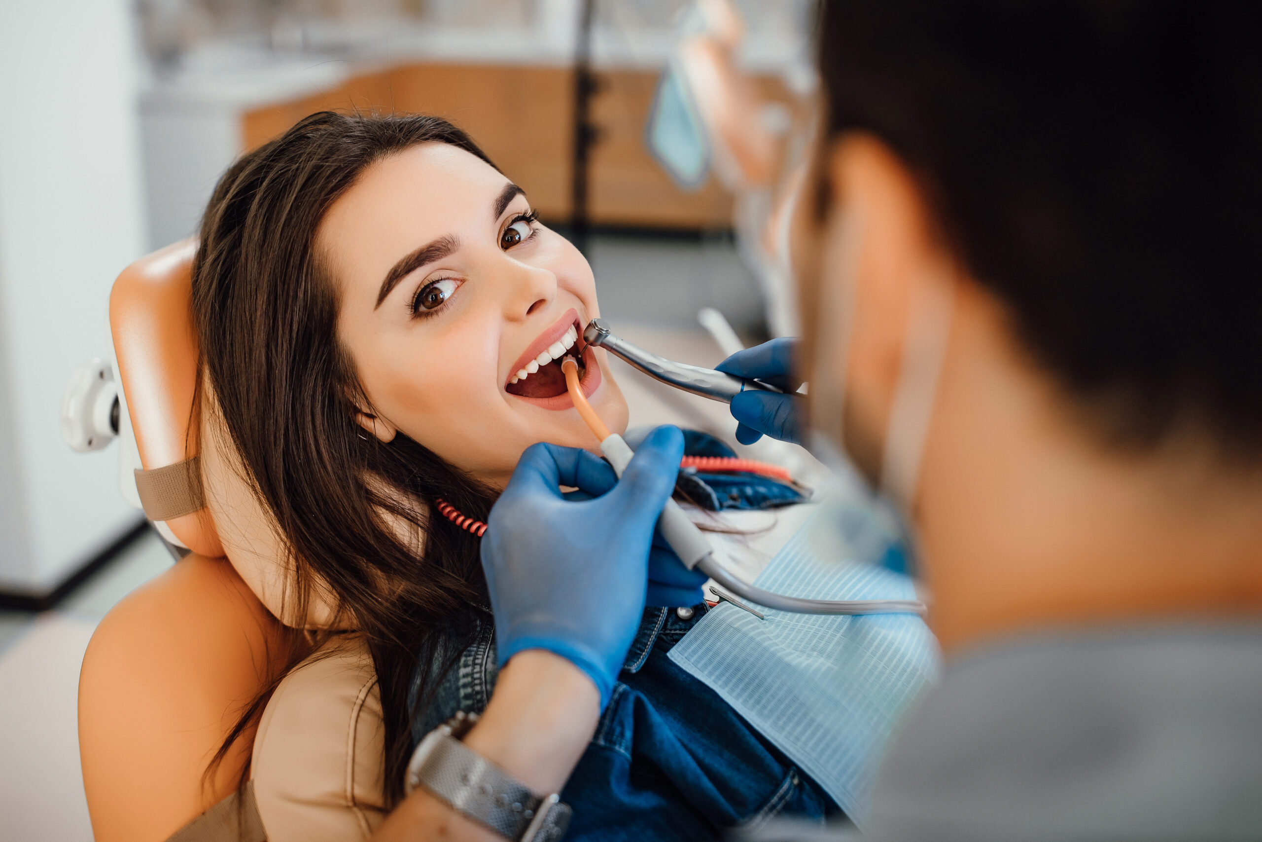 Female patient receiving a dental checkup